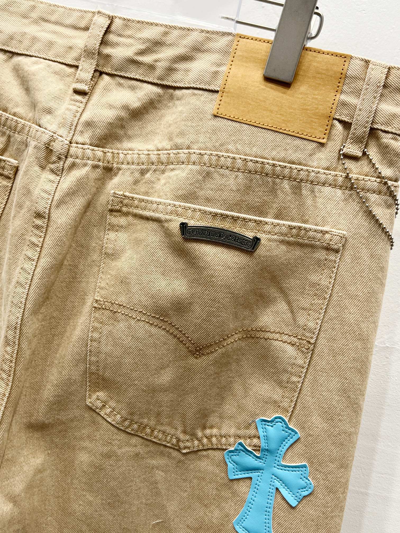 EXCLUSIVE TEAL CROSS PATCH DENIM